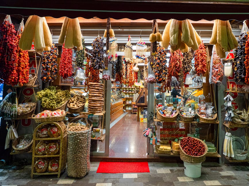 Vibrant display of dried peppers, spices, and herbs at a local spice shop.
